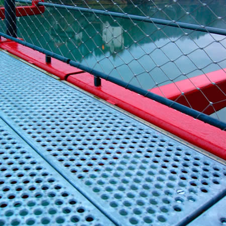 A part of bridge made of the round safety grating.